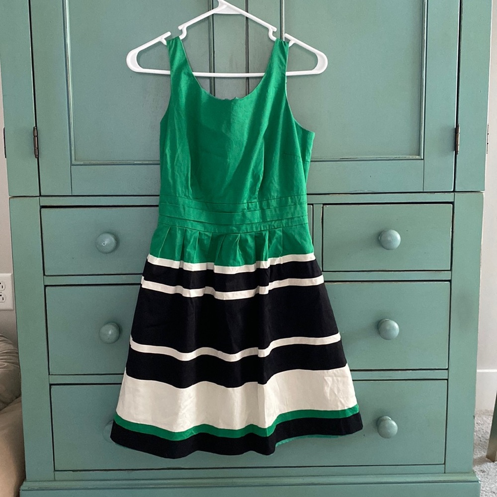 Knee length striped dress.